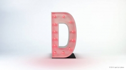 A light-up marquee letter "D" with a pink glow against a white background.