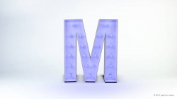 A large, illuminated letter "M" with light bulbs, set against a plain white background.