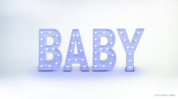 The word "BABY" is displayed in large, illuminated letters, each outlined with small lights, set against a plain white background.