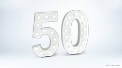 Illuminated sign displaying the number 50 against a plain background.