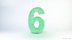 A large, illuminated green number six with light bulbs is centered against a light background.