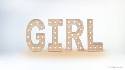 Illuminated sign spelling "GIRL" with small lights on each letter against a white background.