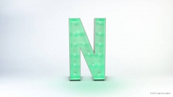A large, illuminated letter "N" with a green glow against a plain background.
