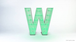 A large, three-dimensional green letter "W" stands against a plain white background. The letter features round lightbulbs embedded in it, giving it a marquee-style appearance.