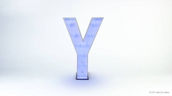 A white, illuminated letter "Y" with a metallic base standing upright on a plain white background.