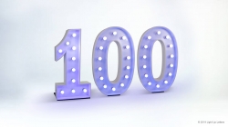 Illuminated number "100" with light bulbs, standing on a white background.