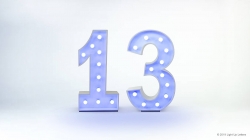 Illuminated number 13 with individual lights inside each digit, set against a plain white background.