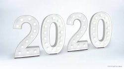 White illuminated numbers displaying "2020" on a light gray background.
