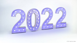 Illuminated numbers "2022" in a marquee style with a glossy finish against a white background.