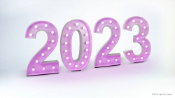 Pink illuminated numbers display "2023" against a plain background.
