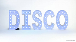 Illuminated letters spelling "DISCO" with lights on each letter against a plain background.