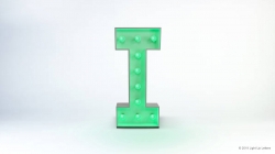 A large, illuminated letter "I" with a green glow against a plain white background.