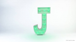 A large letter "J" illuminated with green lights on a white background.